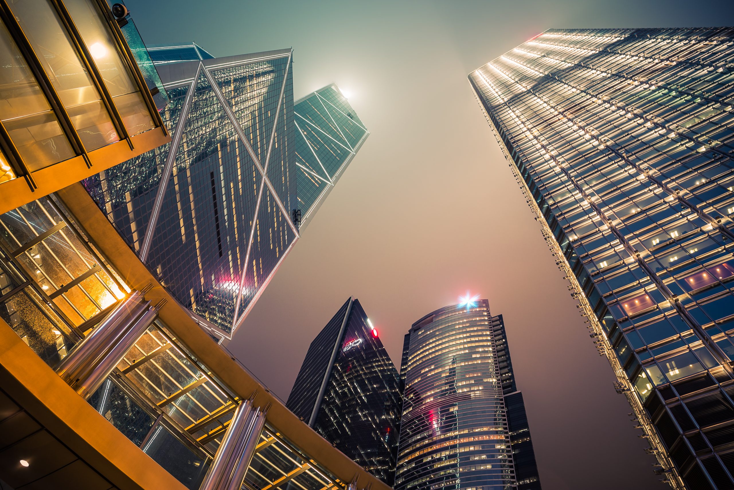 building hongkong city Perspective view of building in downtown hong kong city with light at night time.