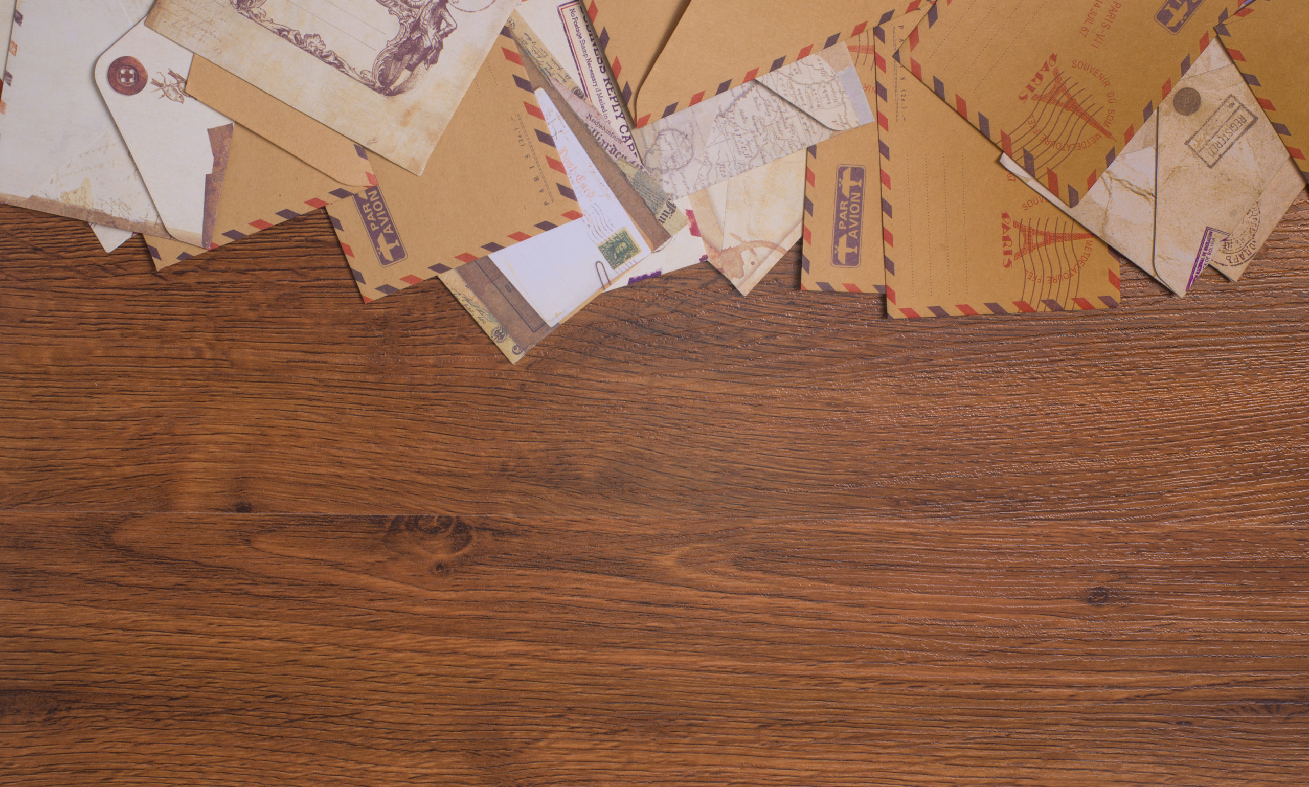Envelopes on a wood background