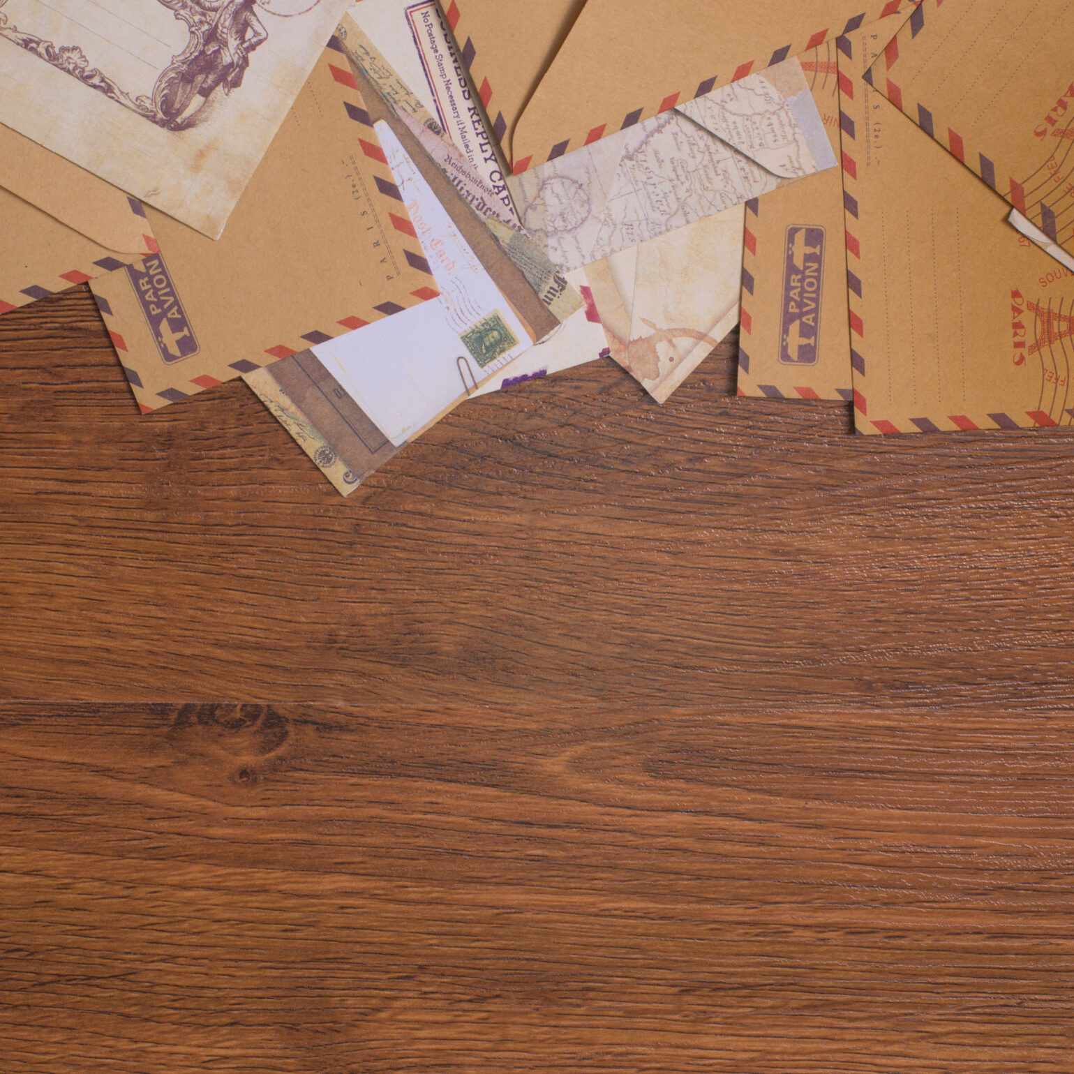 Envelopes on a wood background